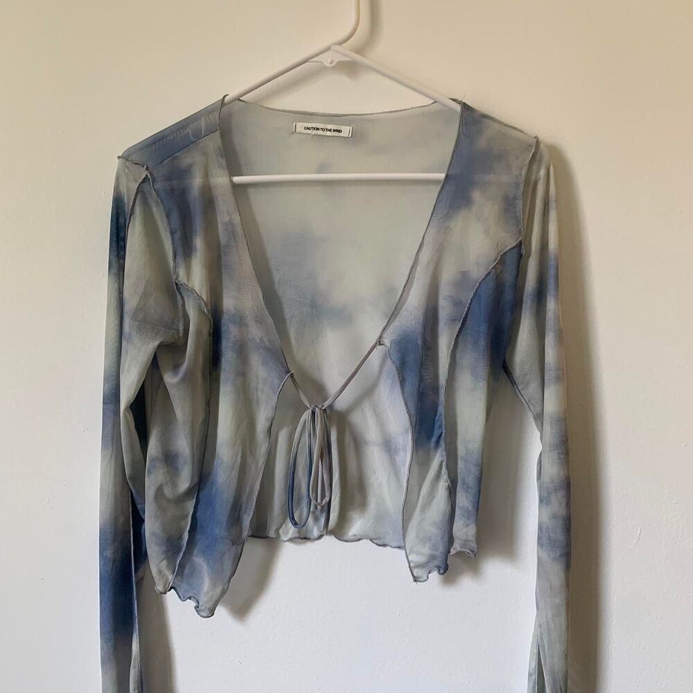 Caution to the Wind Blue front tie blouse